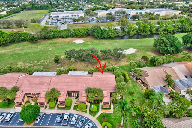 drone / aerial view with a water view