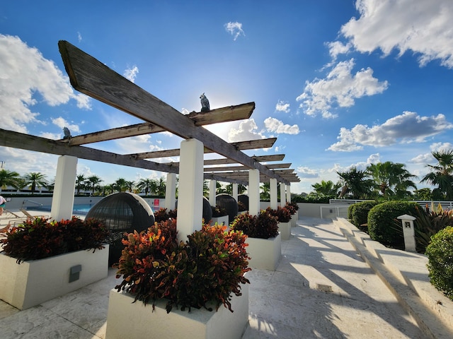 1551 N Flagler Dr Ph L7, West Palm Beach, FL 33401 - view of patio with a pergola