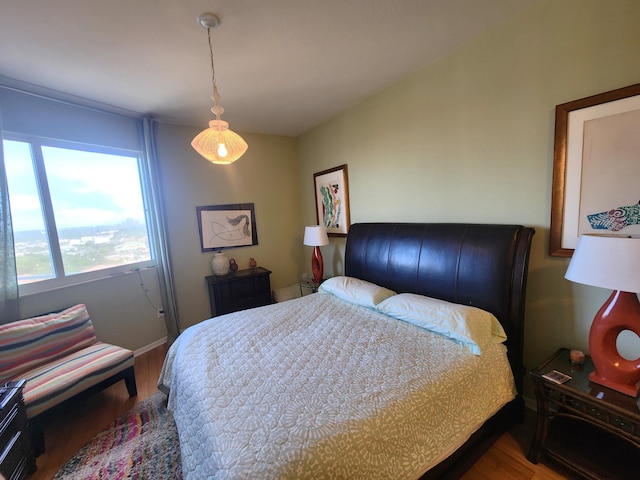 1551 N Flagler Dr Ph L7, West Palm Beach, FL 33401 - bedroom featuring wood finished floors and baseboards