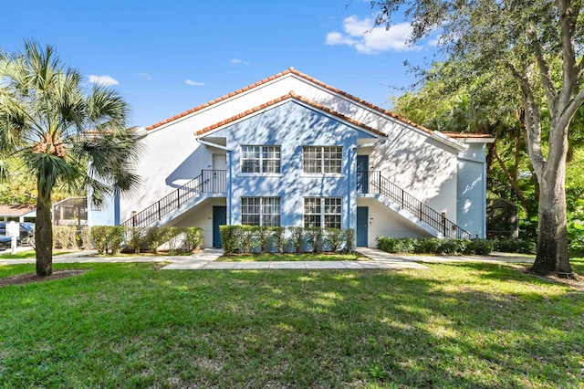 view of front of home with a front yard