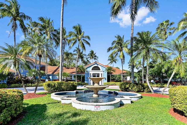 view of home's community featuring a lawn