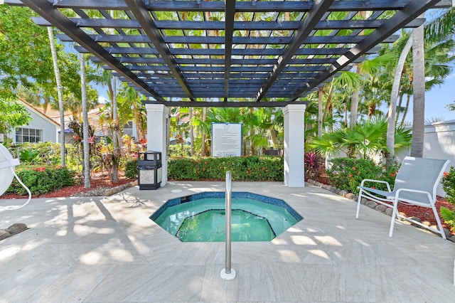 view of pool featuring a pergola, a patio area, and a hot tub