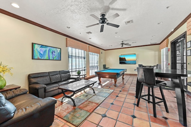 playroom with crown molding, tile patterned floors, a textured ceiling, and billiards