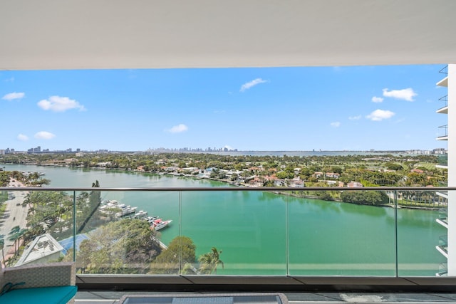 balcony featuring a water view