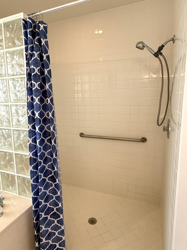 bathroom with a shower with curtain