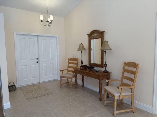 tiled entryway featuring an inviting chandelier