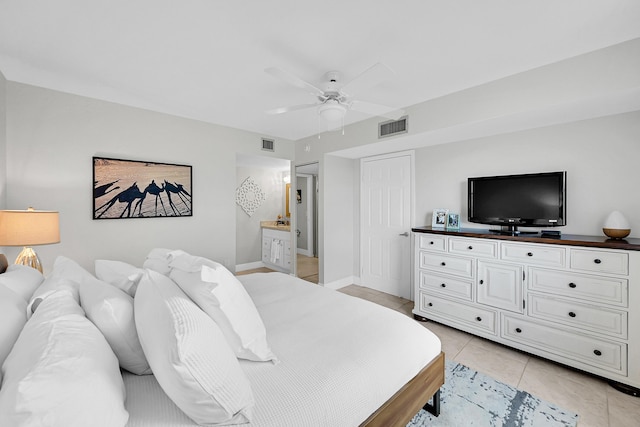 bedroom featuring visible vents, ceiling fan, baseboards, and light tile patterned floors