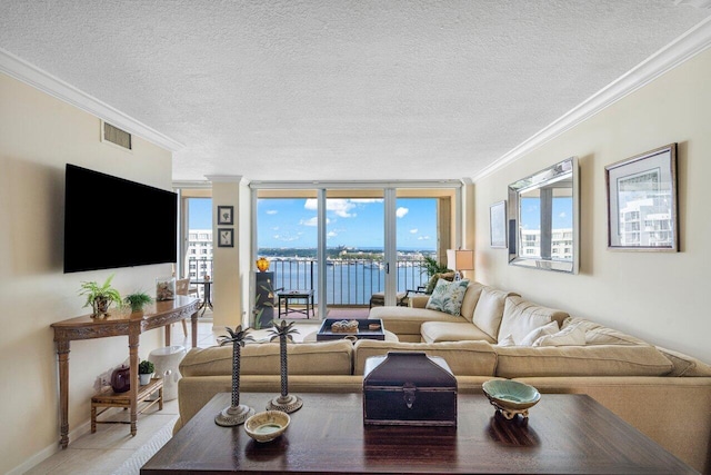 living room with crown molding, light tile patterned floors, visible vents, a textured ceiling, and baseboards