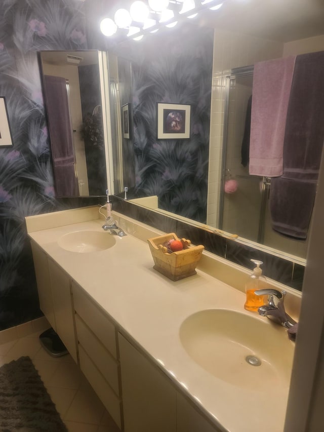 bathroom with vanity and tile patterned floors