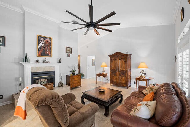 living room featuring light tile patterned flooring, a towering ceiling, and french doors