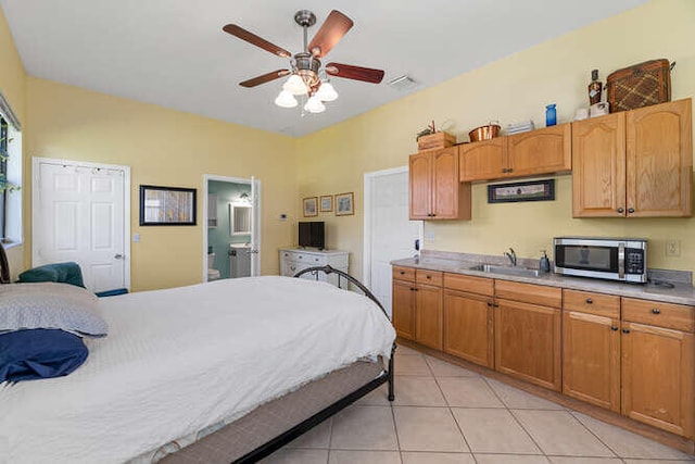 tiled bedroom with sink