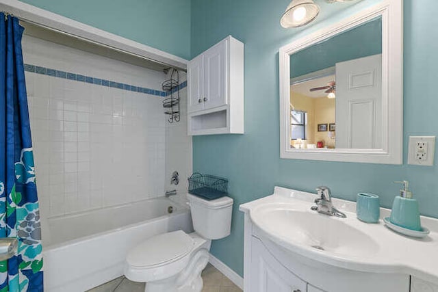 full bathroom with shower / tub combo with curtain, vanity, ceiling fan, toilet, and tile patterned floors