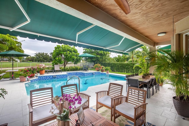 view of pool featuring a patio area