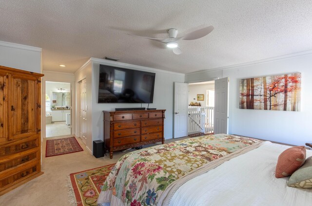 bedroom with ceiling fan, crown molding, a closet, and a textured ceiling