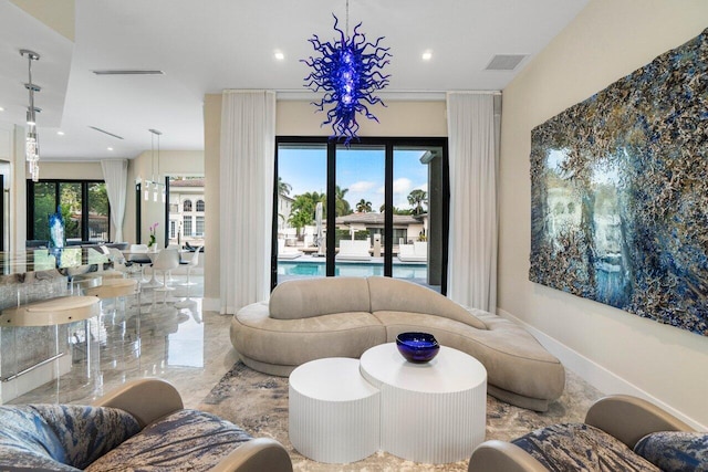 living area with recessed lighting, marble finish floor, visible vents, and baseboards