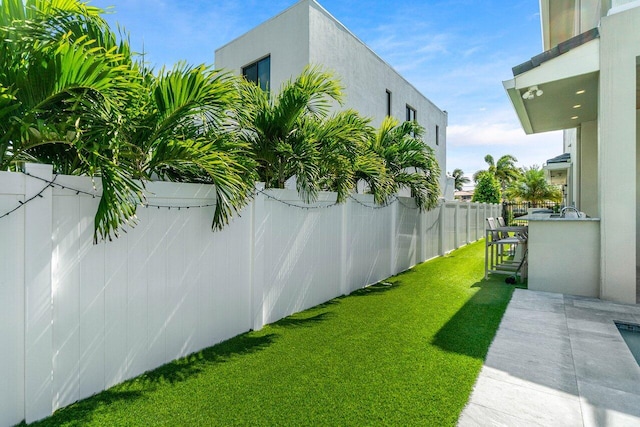 view of yard featuring fence