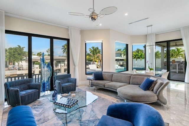 living area featuring ceiling fan, marble finish floor, visible vents, and recessed lighting