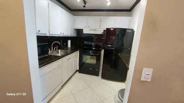 kitchen featuring light tile patterned flooring, sink, tasteful backsplash, black appliances, and white cabinets