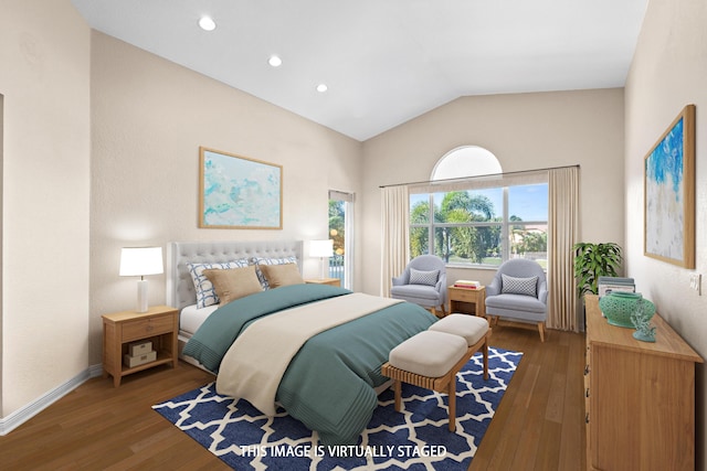 bedroom with dark wood-type flooring and lofted ceiling