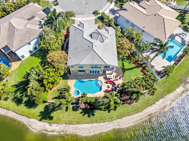 bird's eye view with a water view