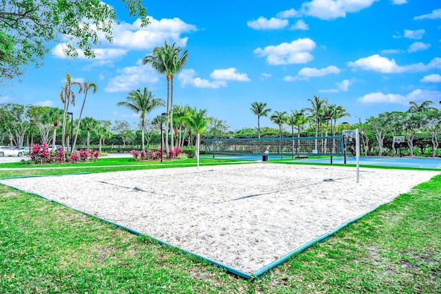 view of community featuring a yard and volleyball court