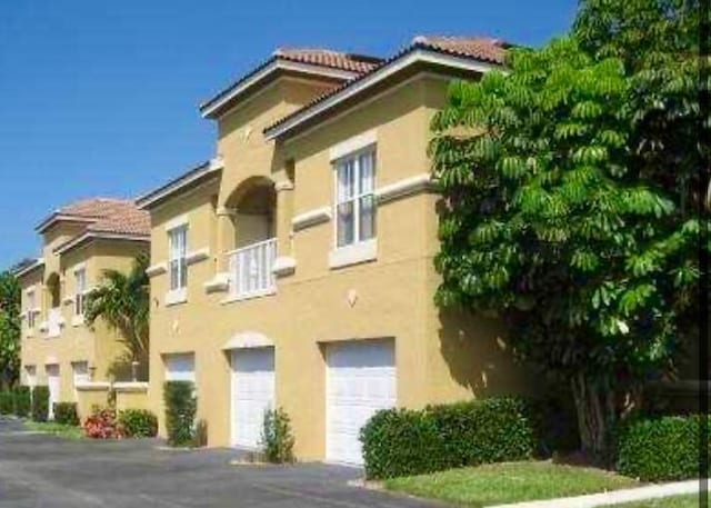 view of property with a garage