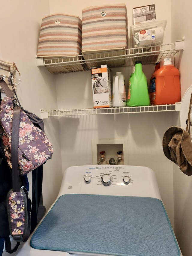 washroom with washer / clothes dryer