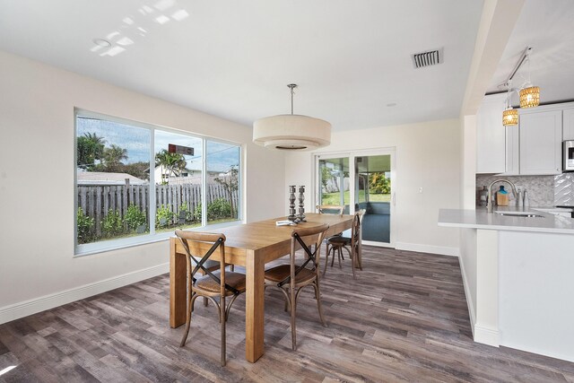 7423 SE James St, Hobe Sound, FL 33455 - full bathroom featuring toilet, shower / bath combo with shower curtain, and vanity
