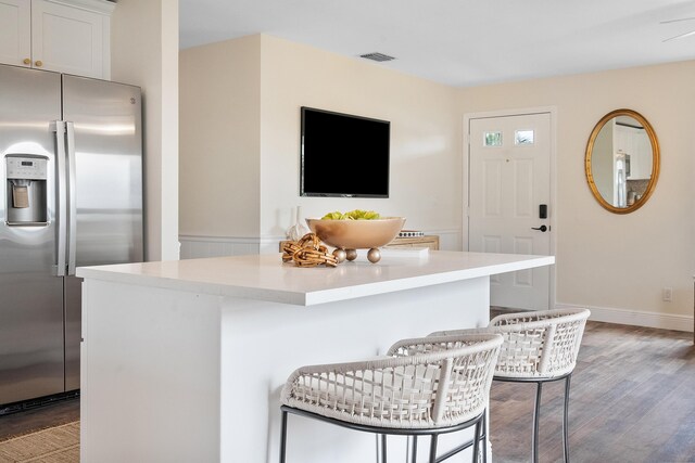 7423 SE James St, Hobe Sound, FL 33455 - dining space with baseboards, visible vents, and light wood-style flooring