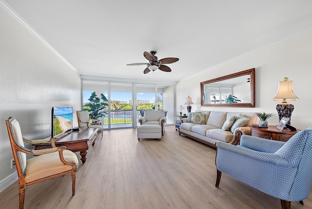 living room featuring crown molding, ceiling fan, floor to ceiling windows, and light wood-type flooring