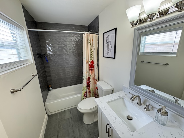 full bathroom with vanity, toilet, wood-type flooring, and shower / bath combo with shower curtain