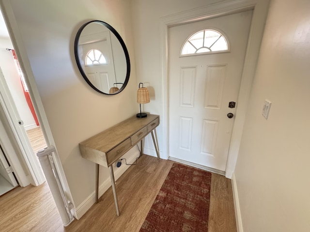 entryway with light hardwood / wood-style flooring