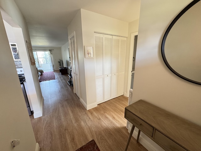 hall featuring light wood-type flooring