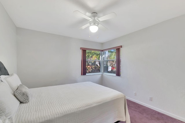 bedroom with ceiling fan and carpet flooring