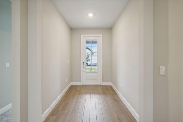 entryway with light hardwood / wood-style flooring