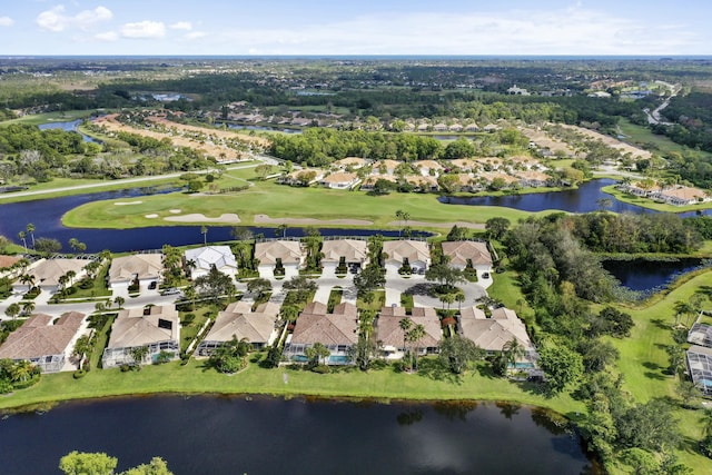 8376 SE Paurotis Ln, Hobe Sound, FL 33455 - aerial view with golf course view, a water view, and a residential view