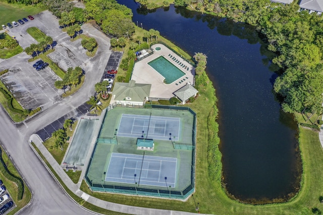 birds eye view of property featuring a water view