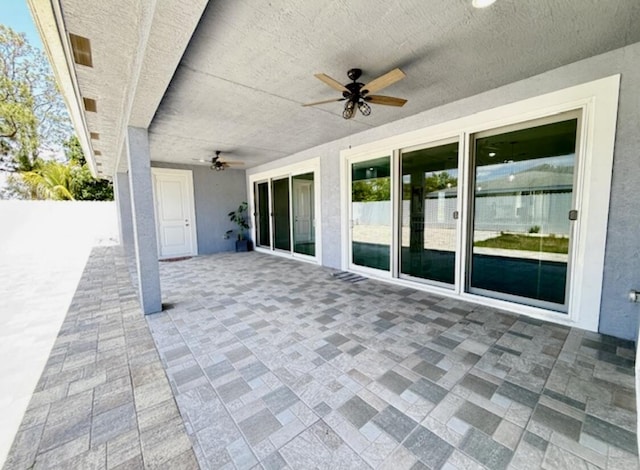 view of patio / terrace featuring a ceiling fan