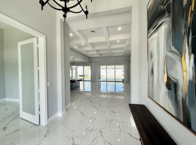 corridor featuring beam ceiling, marble finish floor, recessed lighting, baseboards, and coffered ceiling