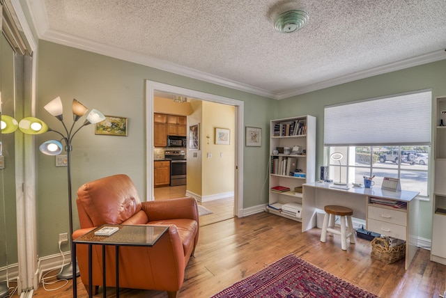 living room featuring crown molding, a textured ceiling, and light hardwood / wood-style floors