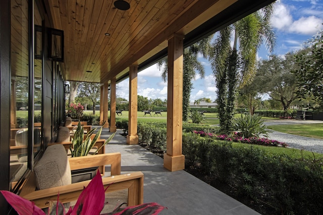 view of patio featuring a porch