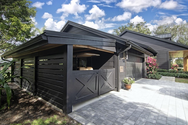 view of outdoor structure featuring a garage