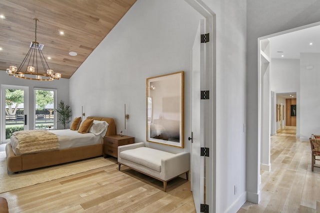 bedroom featuring wooden ceiling, wood finished floors, an inviting chandelier, high vaulted ceiling, and recessed lighting