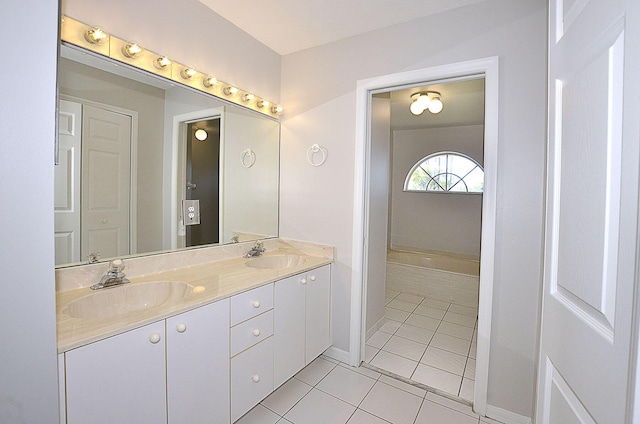 bathroom with vanity and tile patterned flooring