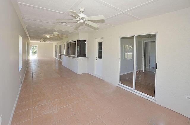 corridor with tile patterned flooring