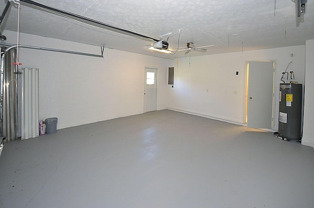 garage featuring a garage door opener, electric panel, and electric water heater