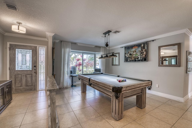 game room featuring light tile patterned floors, a textured ceiling, billiards, and ornamental molding