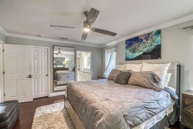 bedroom with a textured ceiling, dark hardwood / wood-style flooring, and ornamental molding