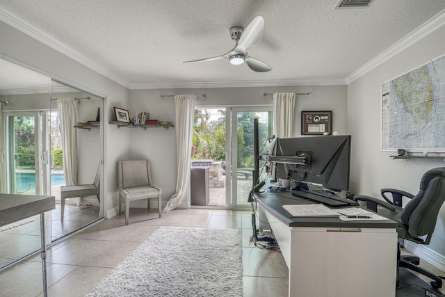 office with ceiling fan, light tile patterned floors, crown molding, and a healthy amount of sunlight