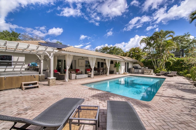 view of pool with a patio, a pergola, a hot tub, ceiling fan, and outdoor lounge area